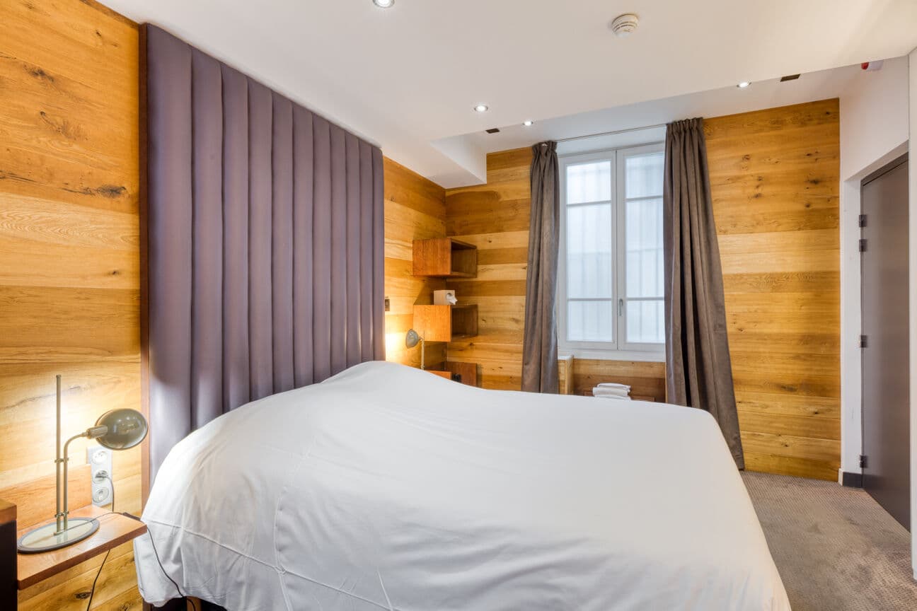 Chambre familiale spacieuse à l'Hôtel du Jeu de Paume